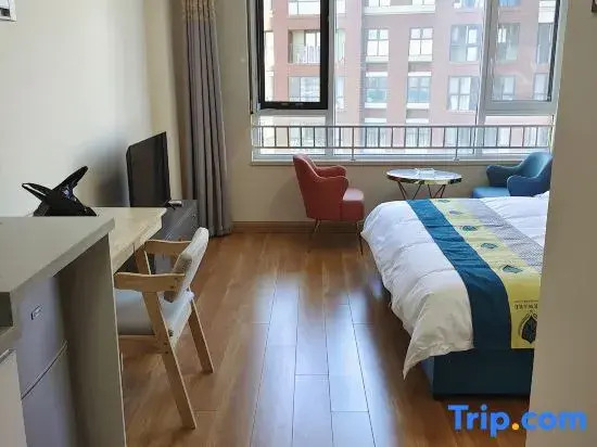 Shuimo Yijia Apartment (Qingte Town 204 National Road Branch)
