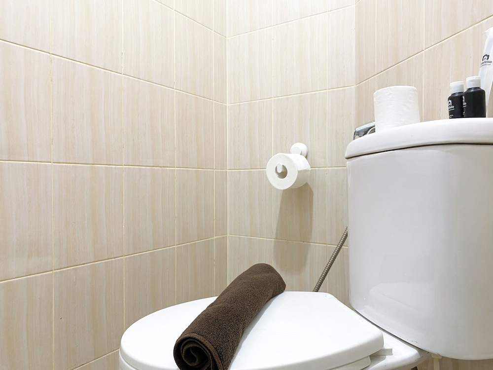 Minimalist And Homey Studio At Grand Kamala Lagoon Apartment