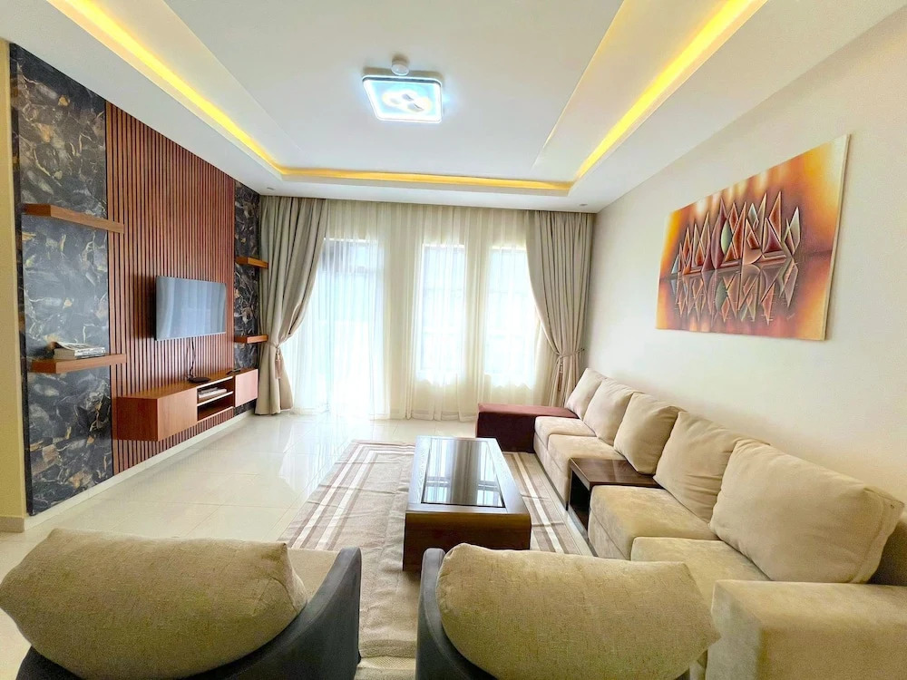 Q-Plus Apartments