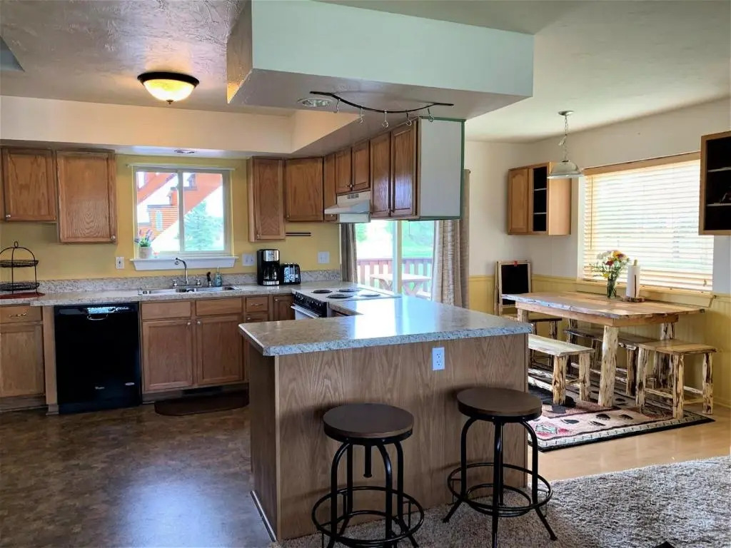 Dog Friendly Sans Souci Cabin with Hot Tub by AAA Red Lodge Rentals