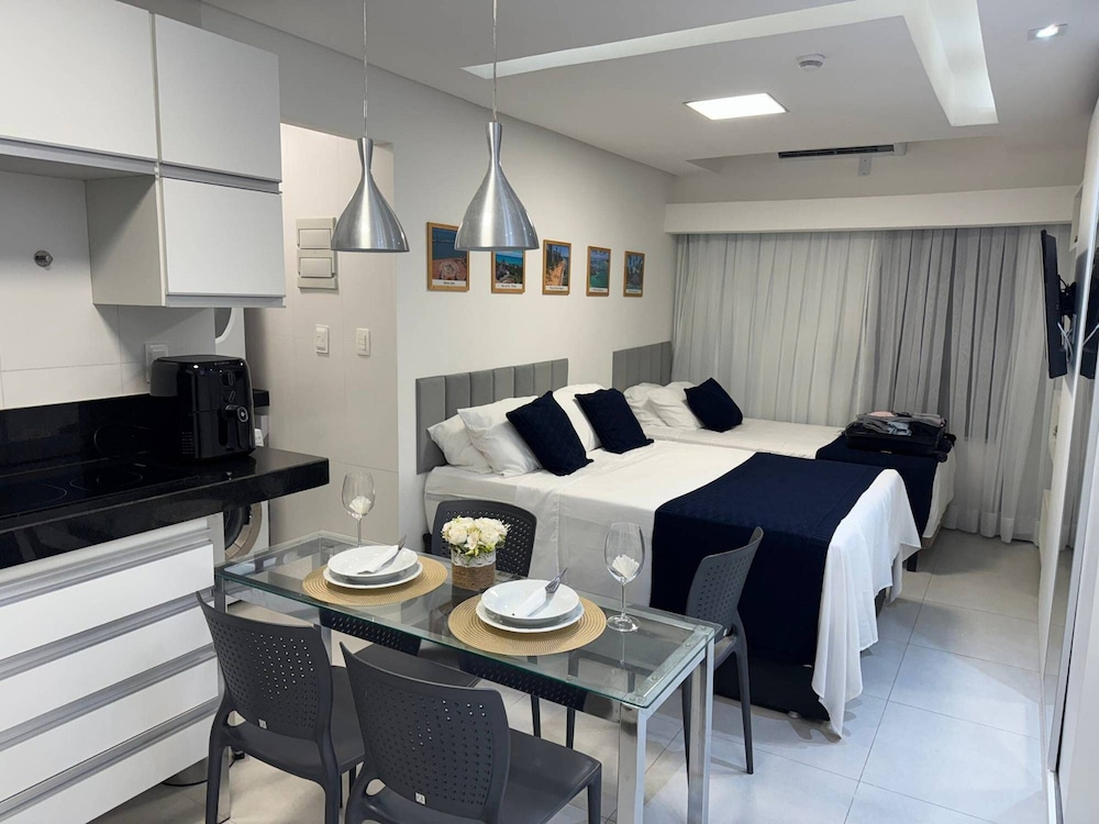Flat com piscina a 50m da praia