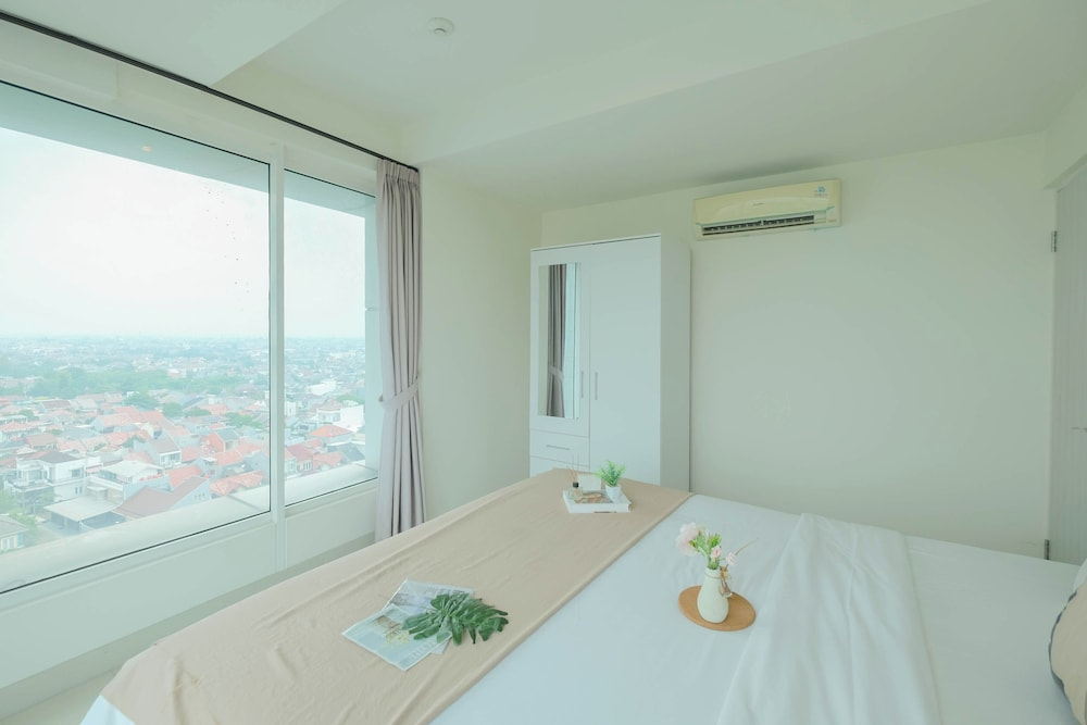 Modern Peach Touch 2Br At Grand Kamala Lagoon Apartment