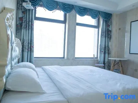 Juqi Light Luxury Homestay (Wanhao Century Plaza)