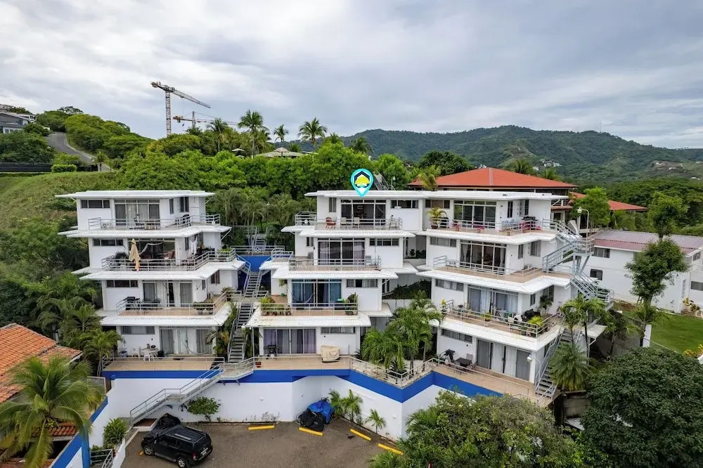 Modern Top-Floor Condo with Panoramic Views and Community Pool