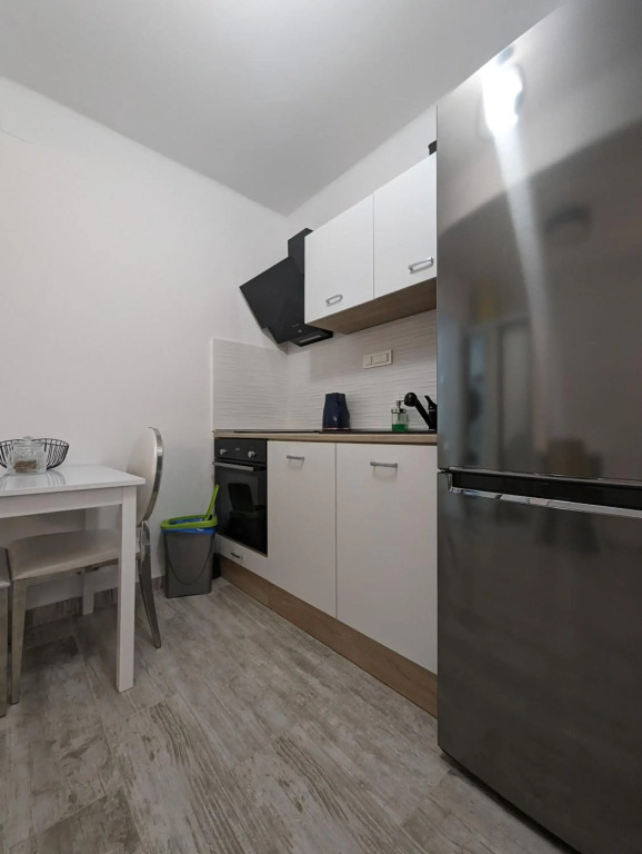Chic Modern Studio in Historic Building w Floor Heating, 65" TV, Washer and Dryer
