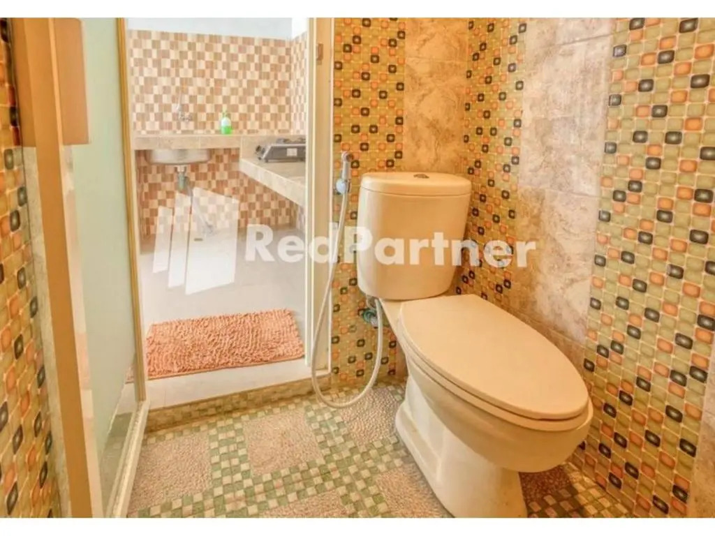 Griya Rahayu Guesthouse Mitra RedDoorz Near Jatim Park 2 Batu(Griya Rahayu Guesthouse RedPartner near Jatim Park 2 Batu)