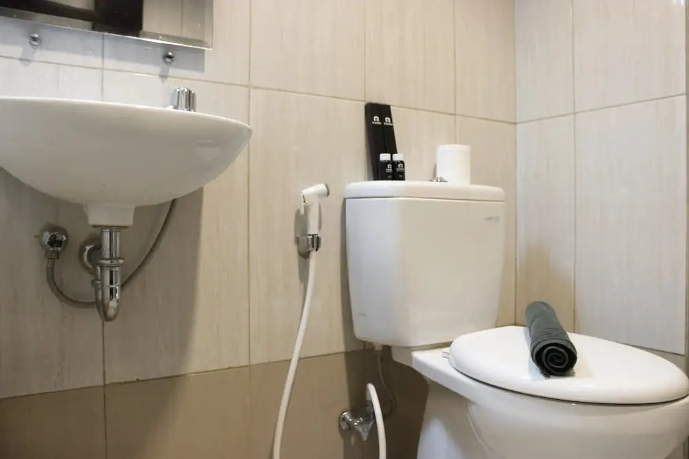 Trendy & Comfy Studio at Tamansari la Grande Apartment