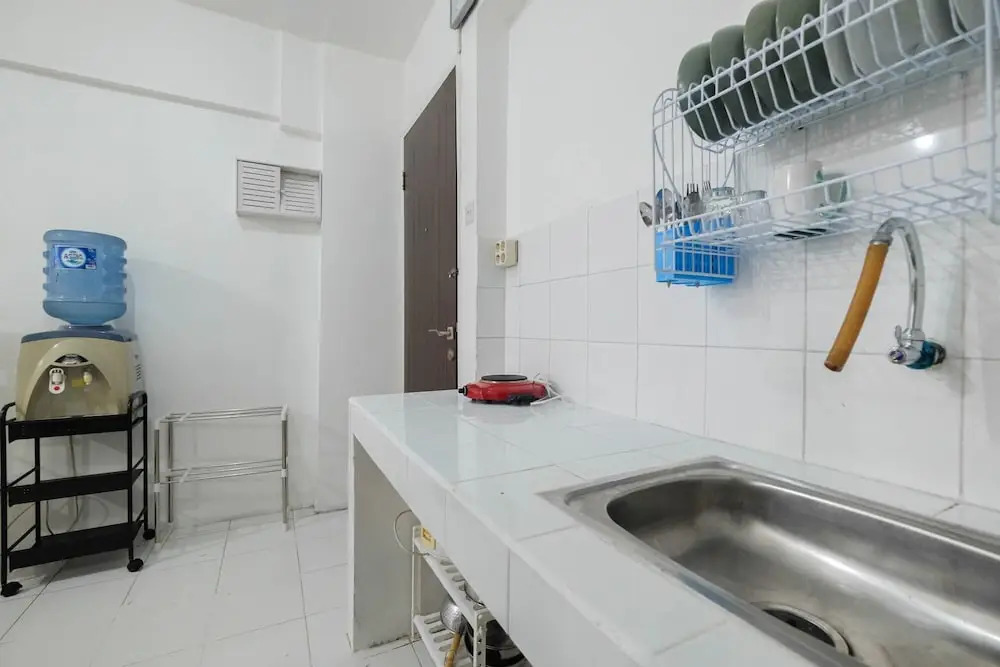 New Furnished 2BR at Mutiara Bekasi Apartment By Travelio