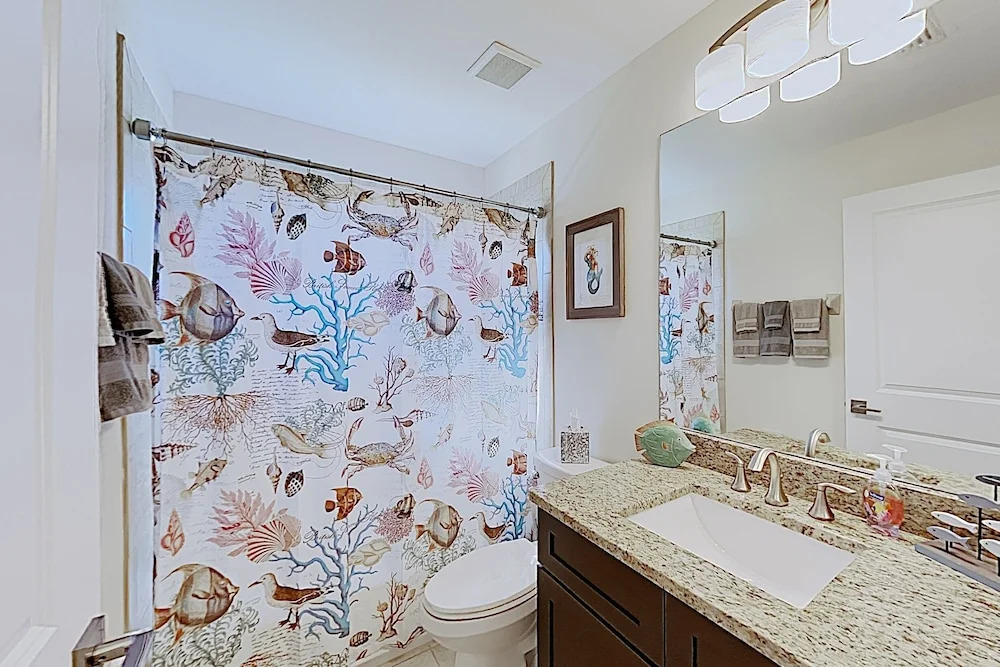 Impeccable Canal-front W/ Lanai & Caged Pool 4 Bedroom Home