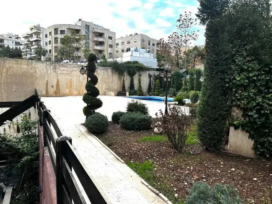 Spacious Amman flat with garden and Pool