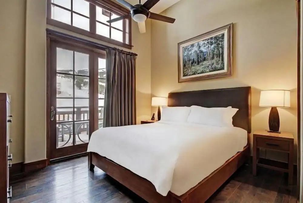 Expansive 4 Bedroom Ski in, Ski out One Ski Hill Residence Located at the Base of Peak 8 with Beautiful Views