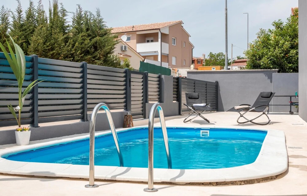 Amazing Home in Peroj With 4 Bedrooms, Wifi and Outdoor Swimming Pool