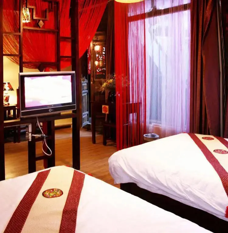 Lijiang Yunmuwan provides breakfast and afternoon tea, offers free airport shuttle service, The hotel provides a platform for visiting the ancient city and Yulong snow
