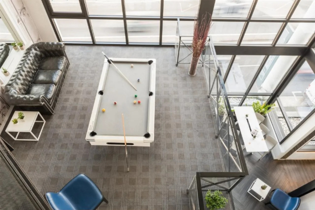 Hotel Atrium by Happyculture