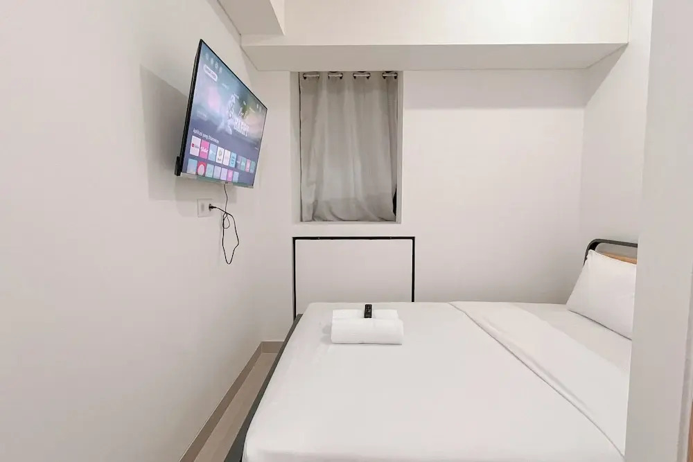 Cozy 1BR (No Kitchen) at Bandaraya - Tallasa City Makassar Apartment By Travelio