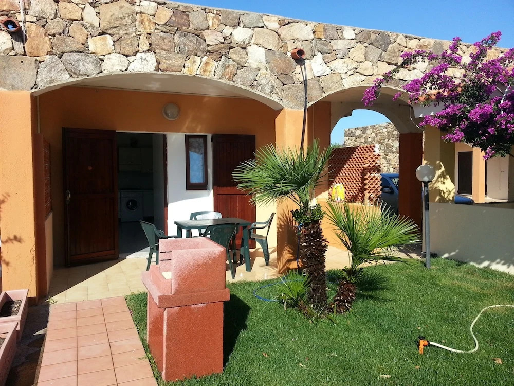 Spiaggia Bianca Pedra Rosa - Your House in Sardinia