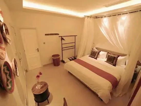 There is a homestay (Haikou Volcano Shop)