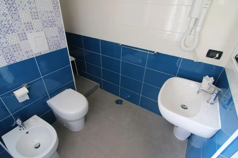 "7 SORELLE B&B" camere in pieno centro città con bagno privato, FREE HIGH SPEED WI-FI, NETFLIX