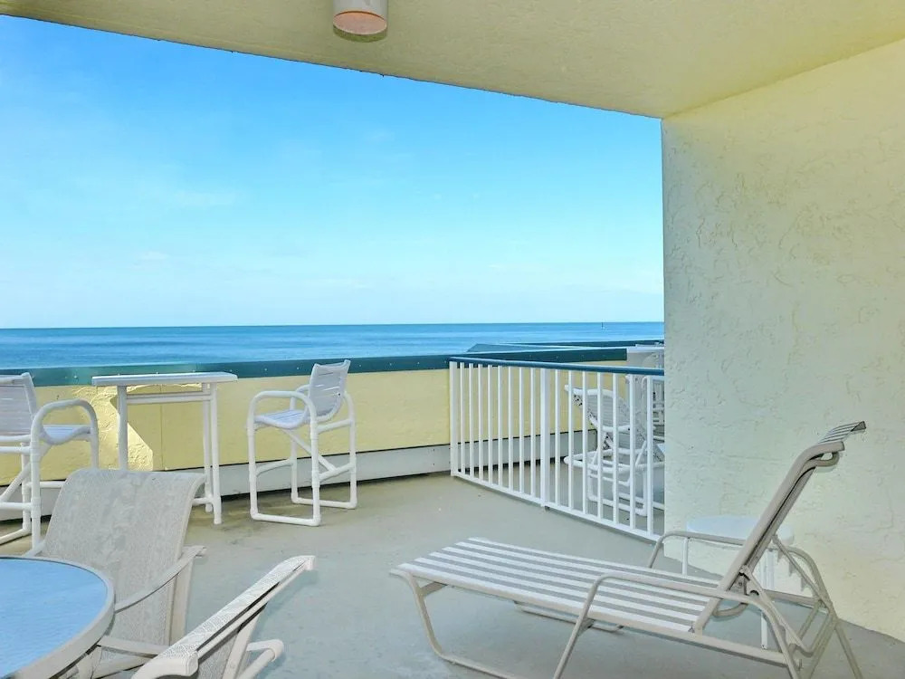 Unmatched Beachfront Condo With Roomy Balcony and Pool