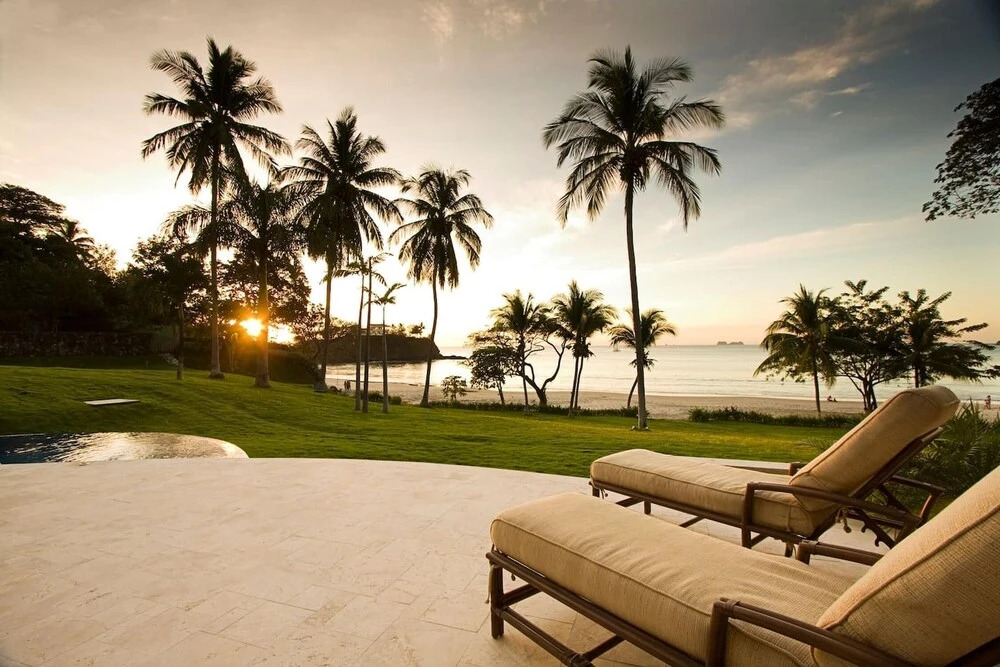 Elegant Mediterranean-Style Mansion with Beachfront Views and Private Infinity Pool