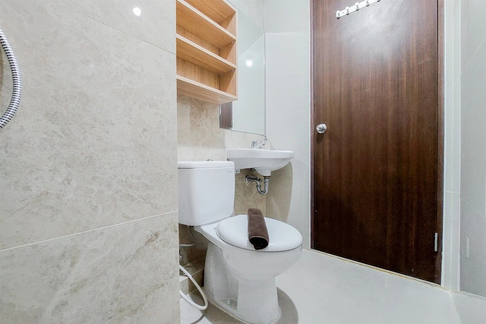 Comfort 1BR at Transpark Bintaro Apartment By Travelio