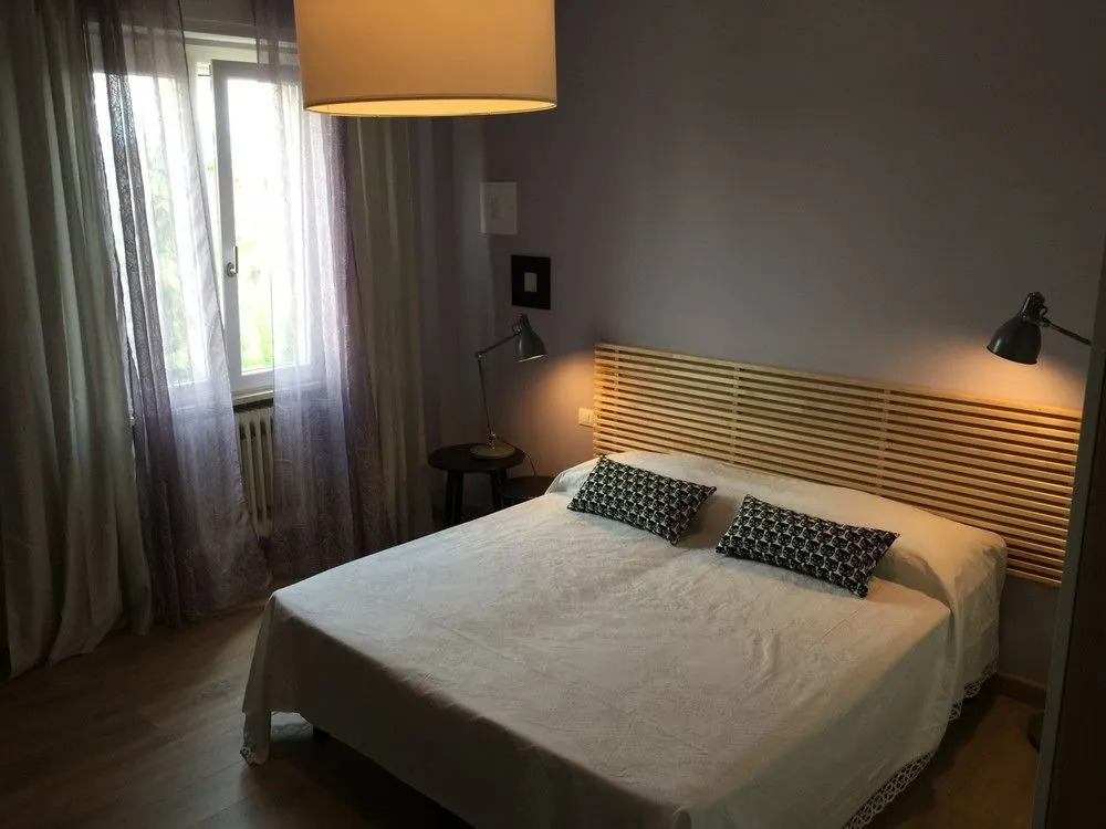 Smiling in Desenzano Lake View DesenzanoLoft Official Partner Homes & Villas by Marriott Bonvoy