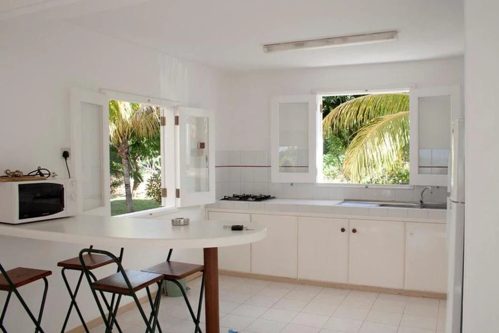 Résidence Les Banians - Complexe privé en bord de mer avec piscine