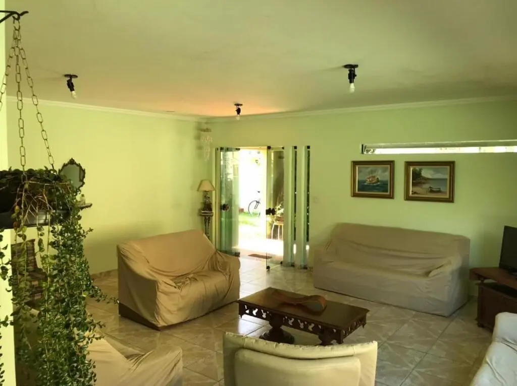 Casa com ar condicionado a 50 metros da Praia da Riviera no Jardim São Lourenço - Casa com Wi-Fi