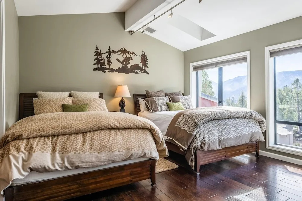 DELUXE SLOPESIDE Condo with 4th FLOOR VIEWS, Elevator and Underground Parking at Canyon Lodge (1849 Condos 409) by RedAwning