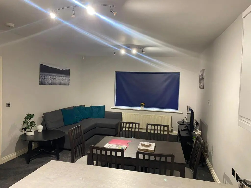 Beautifully refurbished 2 bedroom self-contained apartment with secure parking