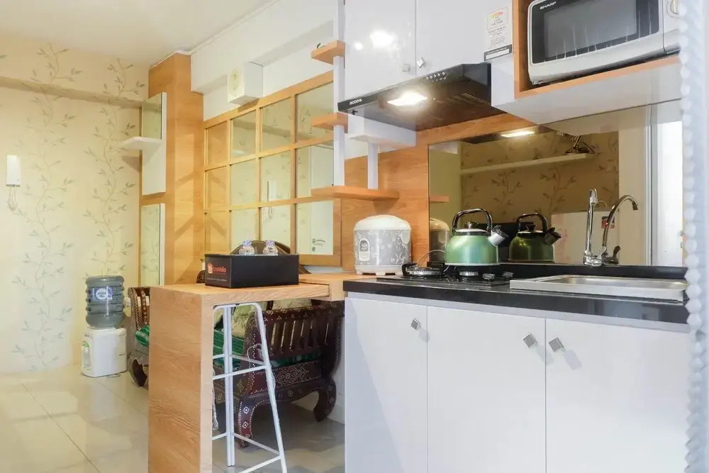 Beautifully Designed 2BR Bassura City Apartment By Travelio