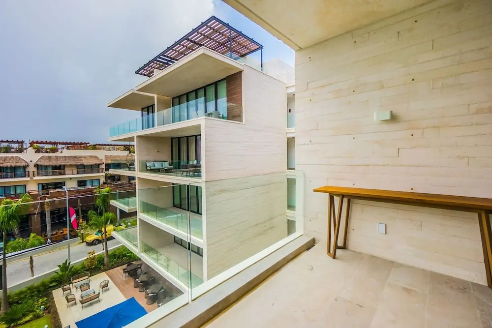 Contemporary Design Oceana 422 Playa del Carmen Condo by RedAwning