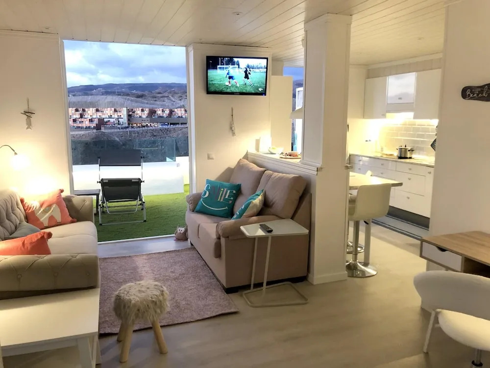 Apartment with 2 Bedrooms in Mogán, with Wonderful Sea View, Pool Access, Furnished Garden