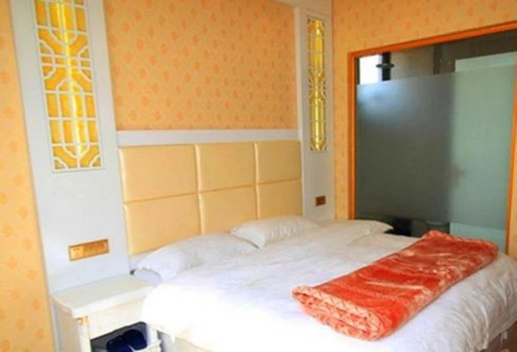 Mingge Busniess Hotel