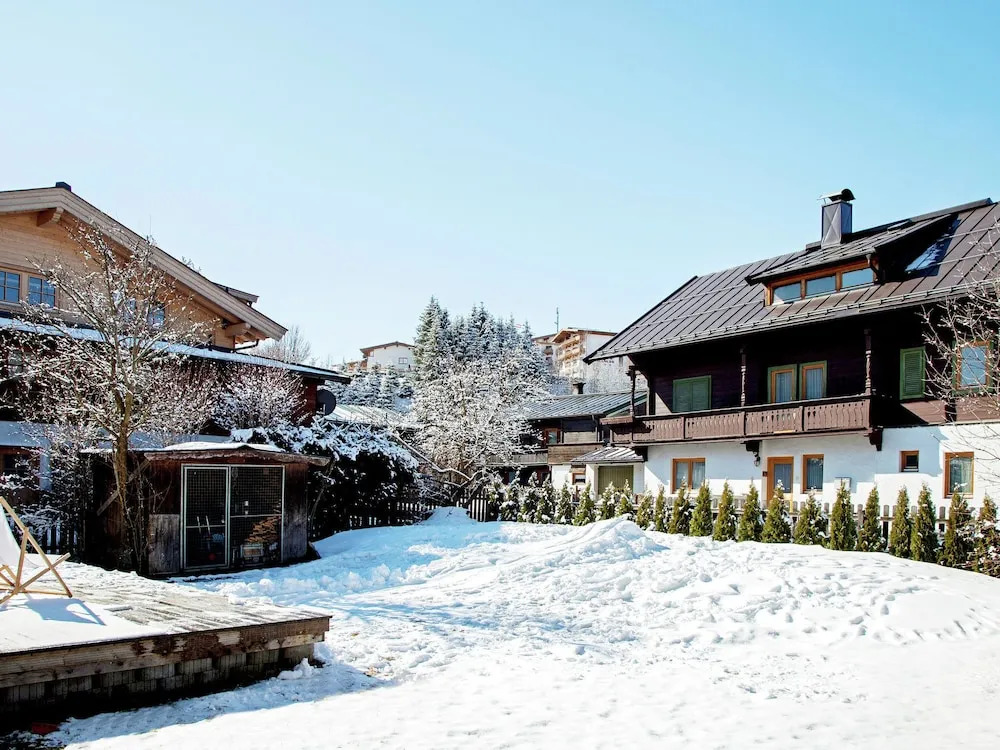 Quaint Chalet in Kirchberg with Terrace, Garden, Ski Storage