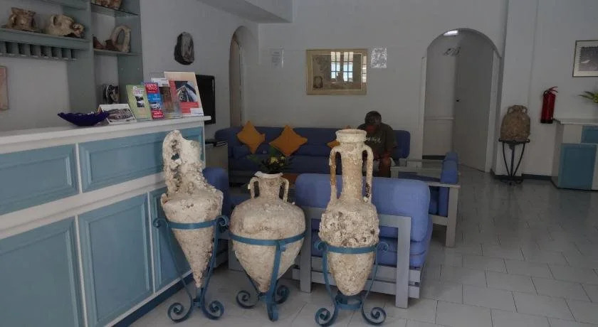 Remezzo Hotel & Studios