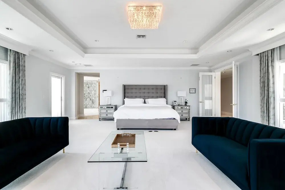Waterfront Mansion With Game Room Gym Media Room and Guest House