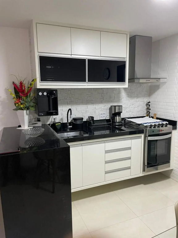 Apartamento moderno e super confortável localizado a alguns passos da Praia Grande