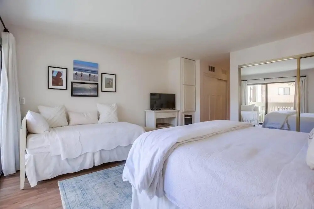 Coastal Chic Furnishings Condo Steps to Beach SBTC 128 by RedAwning