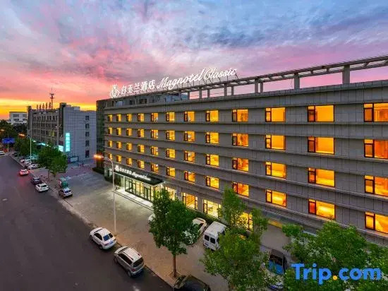 Magnolia Business Hotel ( Dalian Jinzhou Hengda Garden）