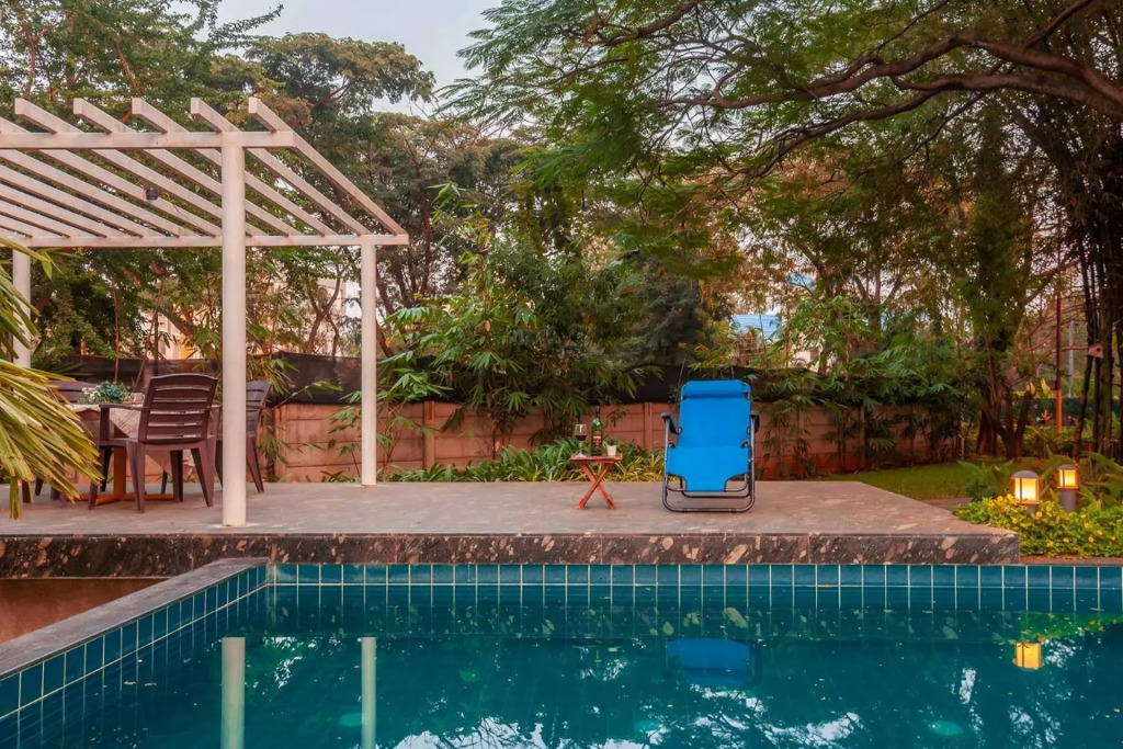 Morning Dew Retreat by StayVista - Modern interiors, Indoor games, Lush greenery, Pool & Gazebo await your escape