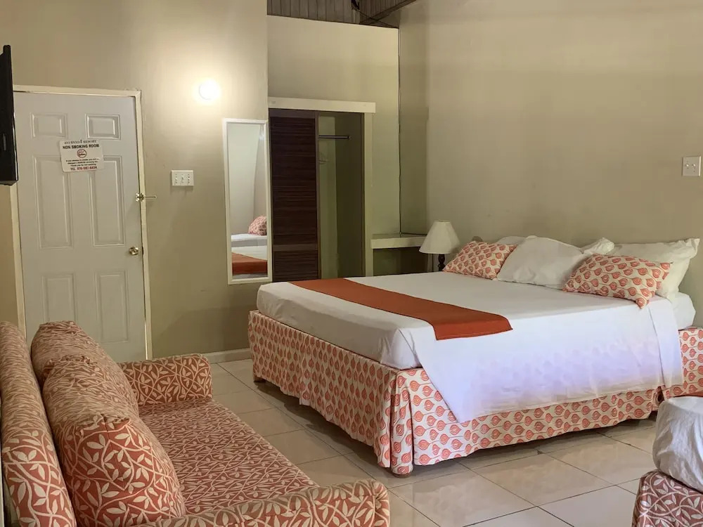 King Suite at Oceanview Resort in Jamaica - Enjoy 7 Miles Of White Sand Beach! 1 Bedroom Villa by RedAwning