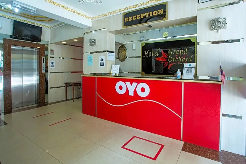 Capital O Hotel Grand Orchard