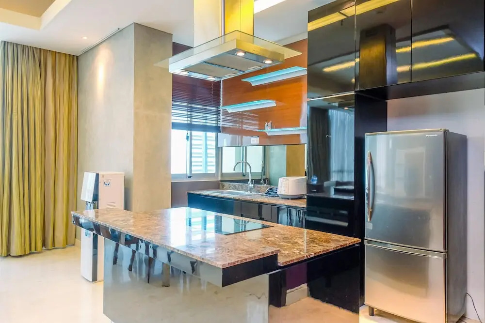 Homey Penthouse 3BR with Extra Room Kemang Village Apartment By Travelio