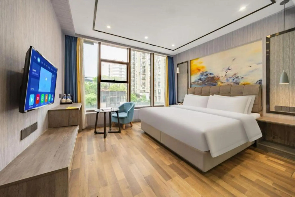 Huanlesong Huayuan Hotel (Chongqing Jiangbei Airport Huixing Light Rail Station)