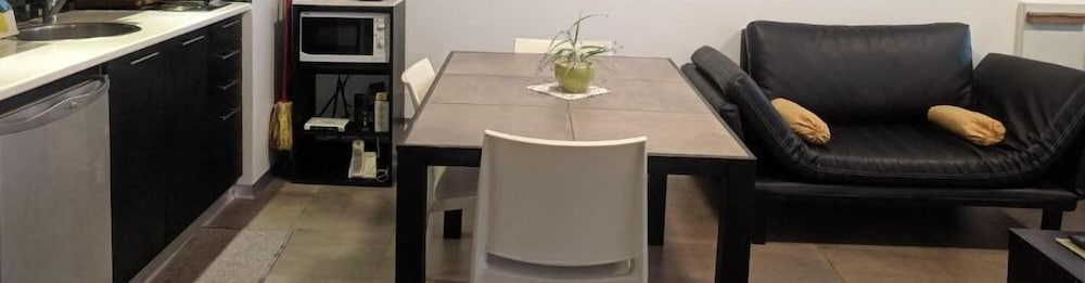 CONCORD PILAR"313 Almendros"50m2 en Suite -living y dormitorio- de 1 a 4 huéspedes