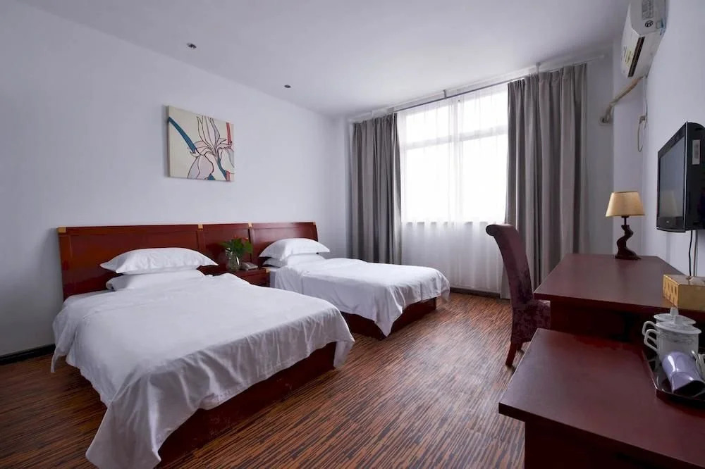 Meigaohua Business Hotel