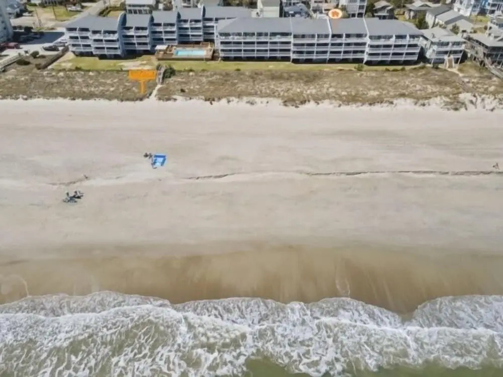 Conched Out - Feel The Ocean Breezes As You Relax On The Deck Overlooking The Lovely Carolina Beach Coastline 2 Bedroom Condo by RedAwning