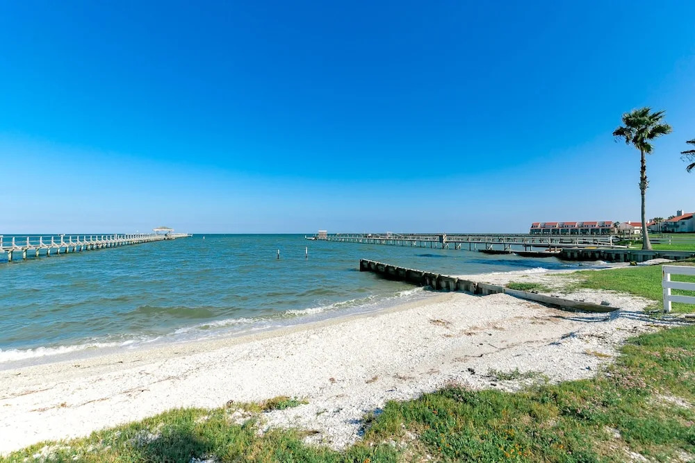 Private Beach Direct Water Views 4BR by RedAwning