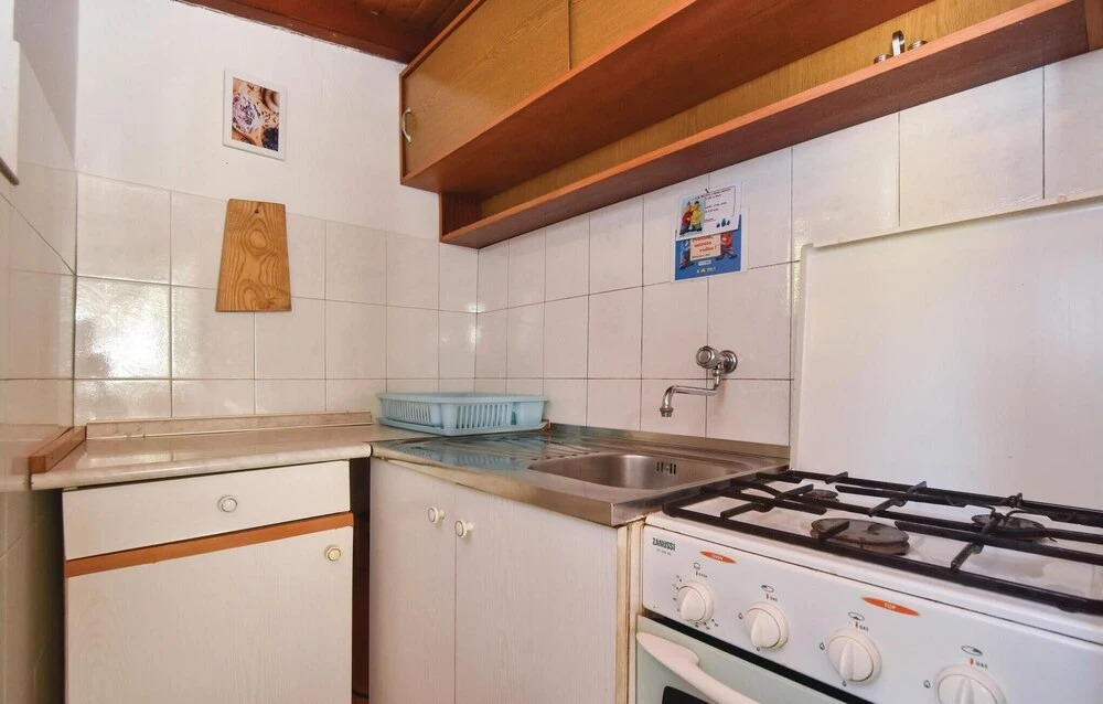 Nice Apartment in Bogomolje With 2 Bedrooms